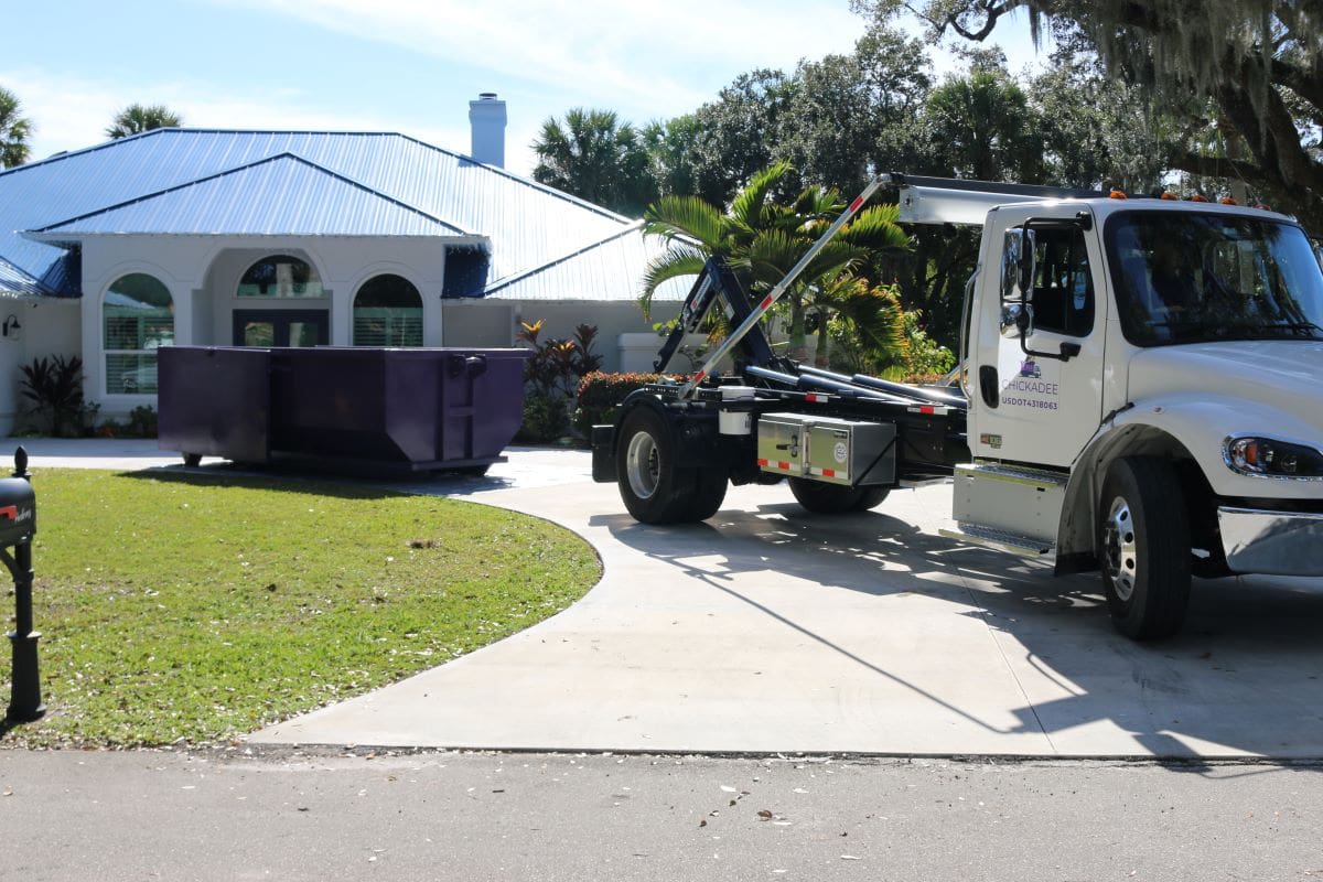 Chickadee dumpster for waste management in Palm Beach Gardens.