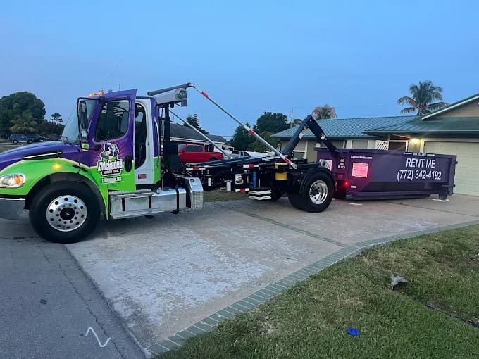 Photo of a dumpster delivery from Chickadee Dumpster Rental.