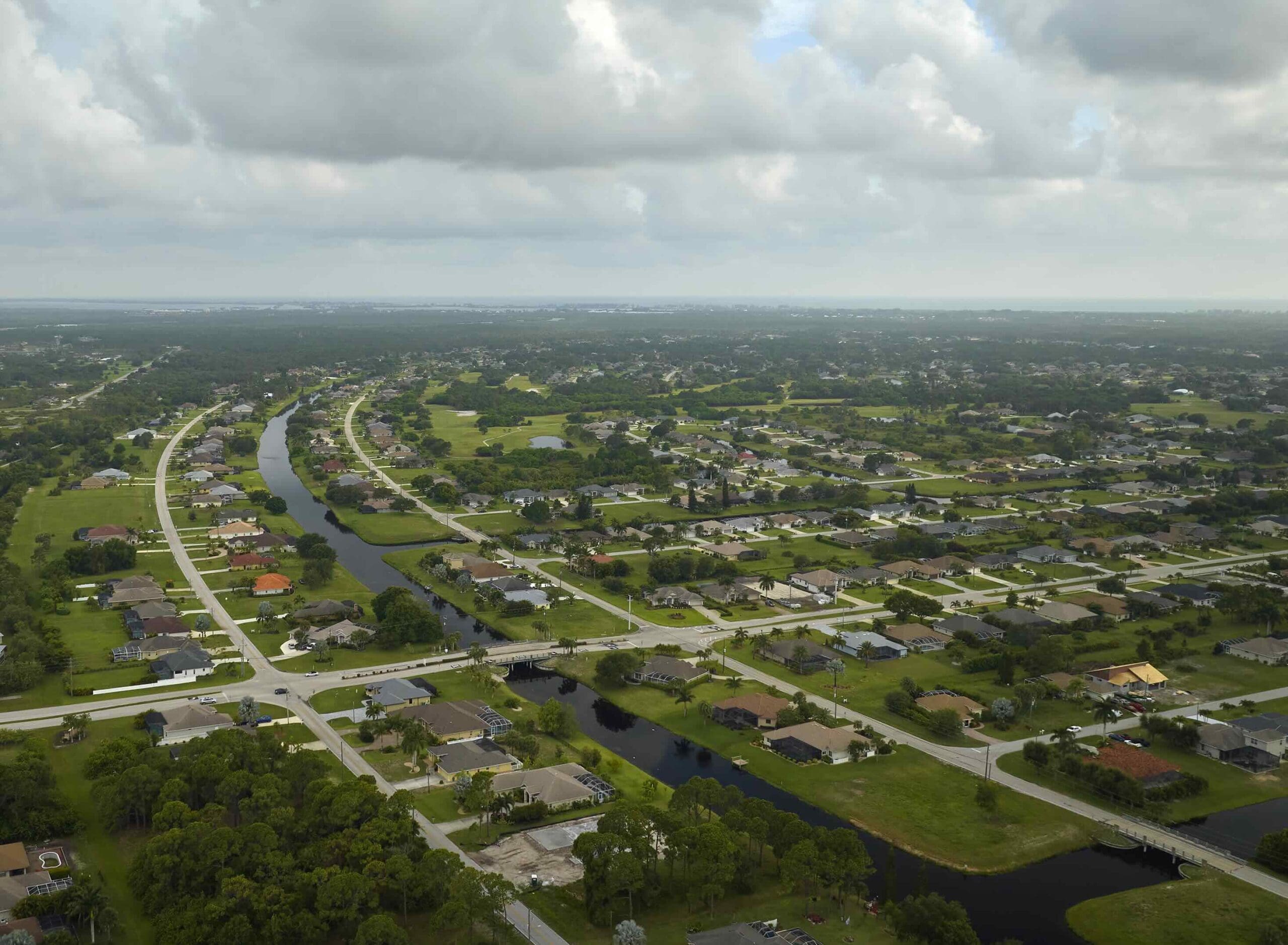 A aerial photo of Port St. Lucie's suburbs, where residential projects often benefit from dumpster rentals.
