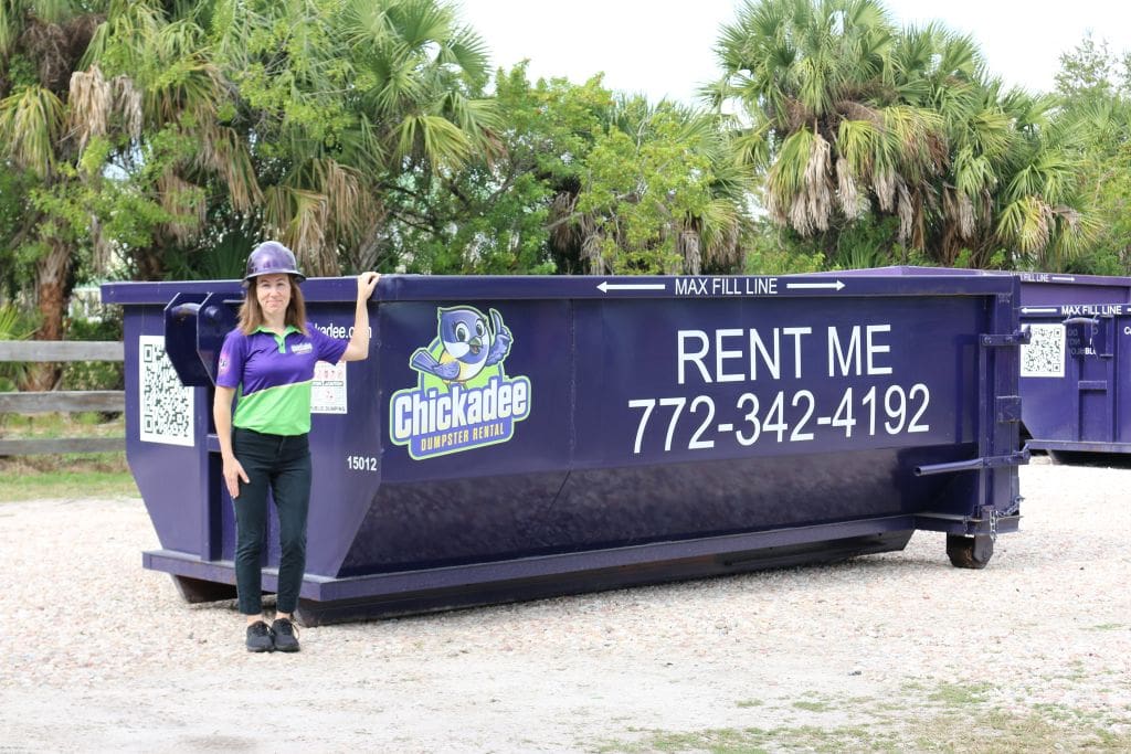 15-Yard dumpster Renta Port saint Lucie FL Owner Jessica displaying the Size of a 15-yard dumpster