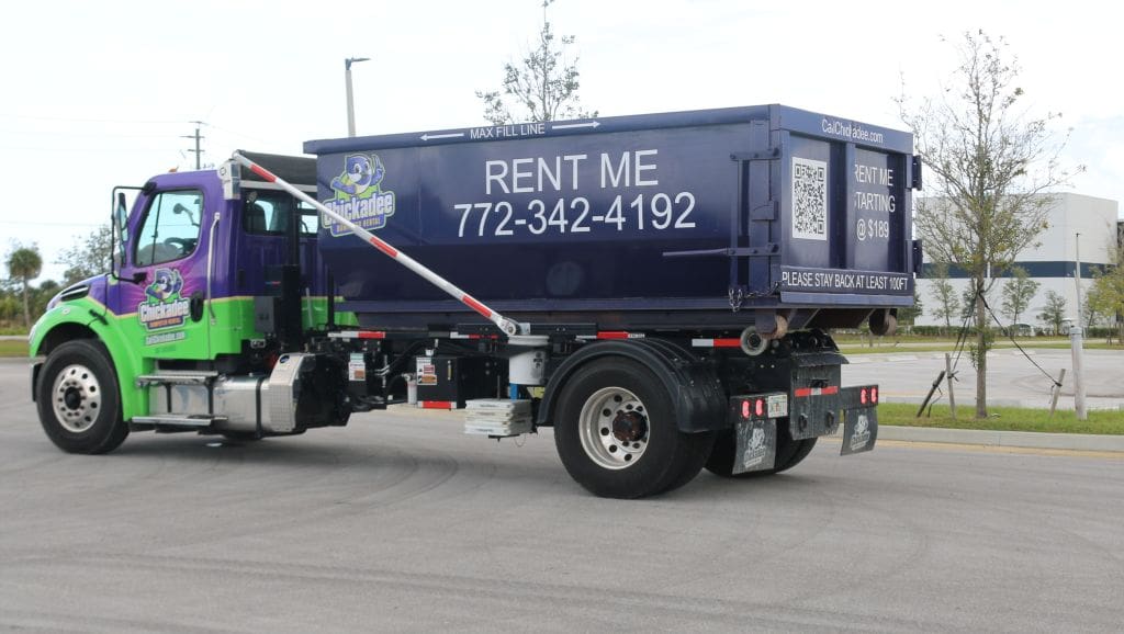 Chickadee dumpster rental truck with 15-yard dumpster