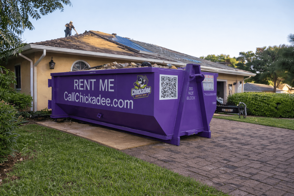 Dumpster rental Jensen Beach 15 yard dumpster with roofing tiles